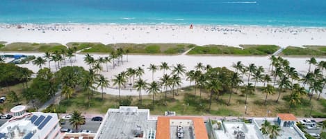 Aerial view over oceanfront Casa Grande South Beach on Miami Beach Boardwalk and on Ocean Drive in the heart of the Art Deco District with walking distance to Lincoln Road and South of Fifth's South Pointe Park. Walk, Jog or Bike around South Beach.
