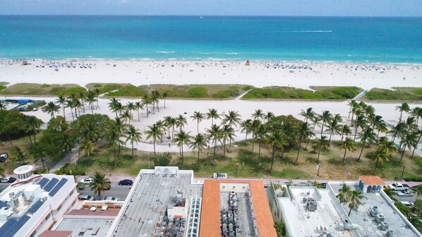 Aerial view over oceanfront Casa Grande South Beach on Miami Beach Boardwalk and on Ocean Drive in the heart of the Art Deco District with walking distance to Lincoln Road and South of Fifth's South Pointe Park. Walk, Jog or Bike around South Beach.
