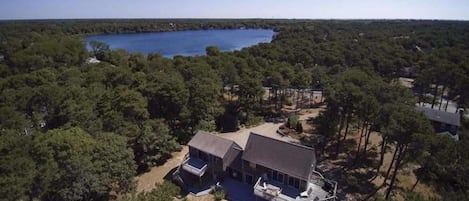 drone view of property with Herring Pond in the distance