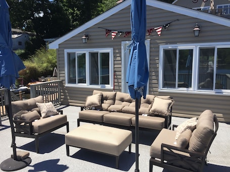 Off the boathouse deck is a 4 season room which features a new Ping Pong table