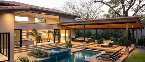 Private pool and sunbeds, view to the outdoor patio