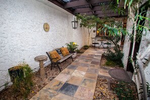 PRIVATE FULLY GATED PATIO IN FRONT OF HOME