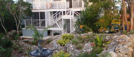 Front view of the villa and terraced garden.