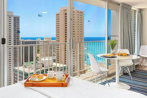 Wake up to endless ocean views right from your bed