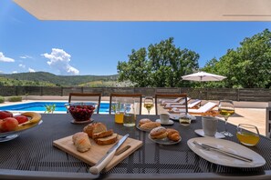 Enjoy the breakfast at outdoor dining table for 8 with magnificent views