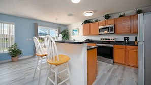 Kitchen and breakfast bar