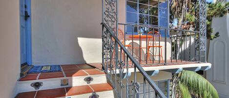 Front entryway with stairs, this is an upstairs 2 bedroom, 2 bathroom villa, downstairs can also be rented together!