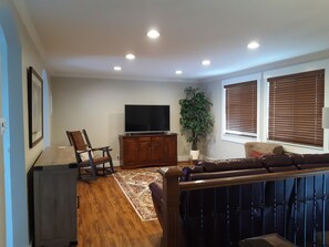 Smart TV with Netflix and DVD player.  Large library of DVDs, games and books