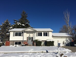 Winter scene,  Bright upper level. secure garage, front door entrance