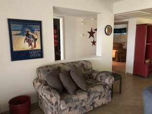 Living room with views to two bedrooms & bath