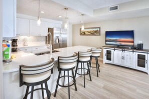Kitchen and living room area - open concept floorplan and view to ocean from this room.