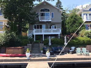 View of the Lake House from the 50 ft dock.  The house is right on the lake