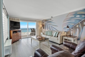 Living Room-plush furnishings, upgraded decor, balcony access and amazing views