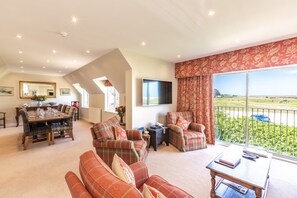 Lounge/dining area with views across the Old Course and the Old Course Hotel.