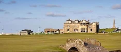 Swilken Bridge looking up the 18th fairway towards the R & A 