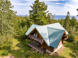 Log cabin with lake superior view.
