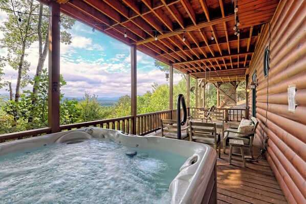 New 6 person hot tub on lower level covered porch with increadible views