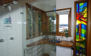 Ensuite bathroom with harbour view