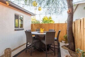 Relaxing Outside seating with fire pit feature.