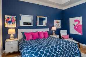 Rich color and modern decor create a special space in the Master bedroom.