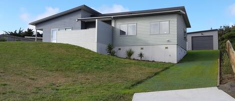 Front view with new driveway