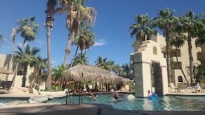 Main pool with pool bar and waterfall. Child friendly.