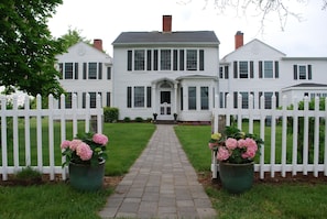Classic home with white picket fences.