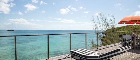 Welcome to Touch of Class Villa overlooking the calm Caribbean sea.  Our deck has the best ocean views on the island!  Steps lead right down into the water with a perfect sandy bottom.