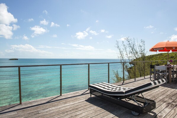 Welcome to Touch of Class Villa overlooking the calm Caribbean sea.  Our deck has the best ocean views on the island!  Steps lead right down into the water with a perfect sandy bottom.