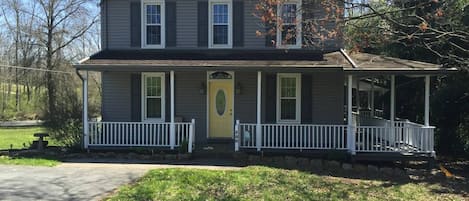 peaceful country style home. Nestled in the country alongside a trout stream