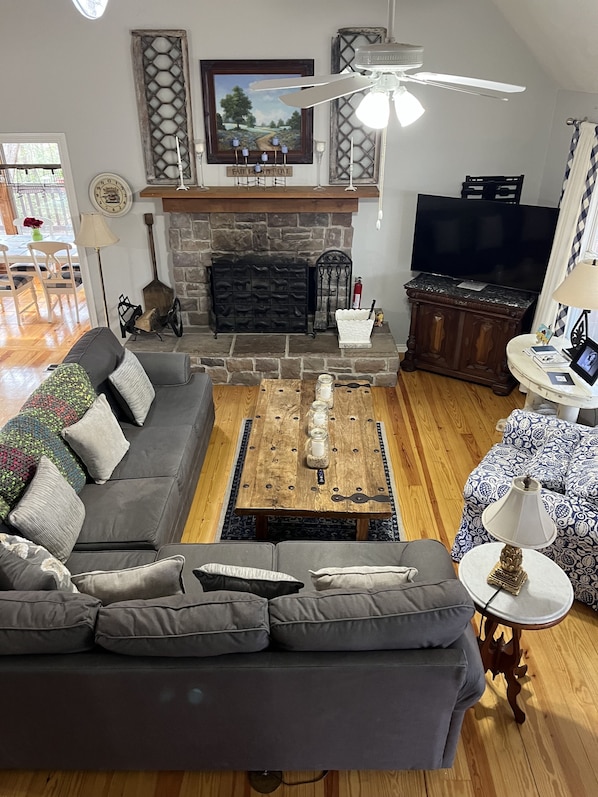 Cozy Living Room with Sectional Sofa and 52" Smart TV