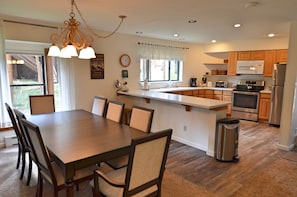 Stunning Dining Area and Kitchen - Recently remodeled kitchen and dining room area. The dining room will easily seat all of the guests and the kitchen is fully equipped.