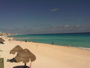 A perfect day on our sandy beach.  No coral here! Leave the beach shoes at home!