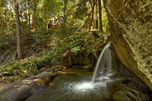 Gorgeous 10 ft waterfalls & loud creek frontage