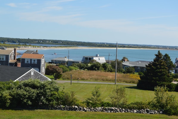 cottage in left foreground with Goosewing Beach in background