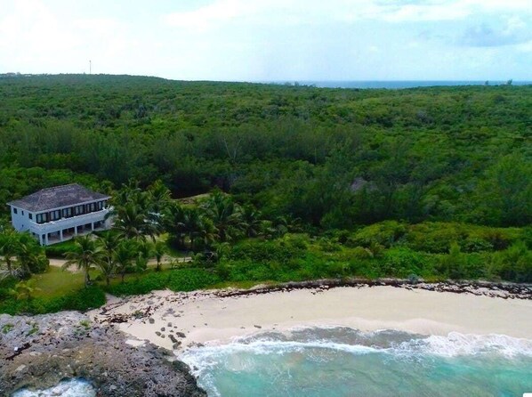 Welcome to Alfred House!  Alfred House is located on a point between two spectacular beaches, Casuarina Bay Beach to the south (pictured here) and the deserted northern end of world-famous French Leave Beach to the north.