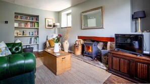 Living room with log burner, Walkley Wood Cottage, Bolthole Retreats