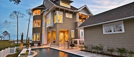 Private pool area overlooking wetland and lake.