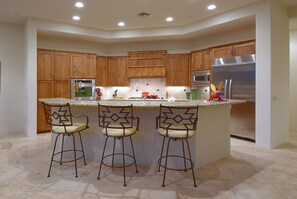 Kitchen breakfast bar - facing out from kitchen are gorgeous canyon views