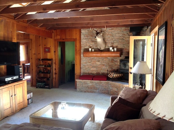 Cozy, spacious open beam living room