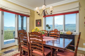 Dining area includes table to seat 12 & bar seats 5 while you enjoy sunrise/set!