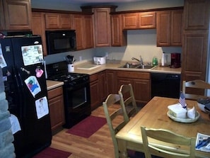 kitchen with all the things you need (dishes,cookware,toaster,coffee maker, ect)