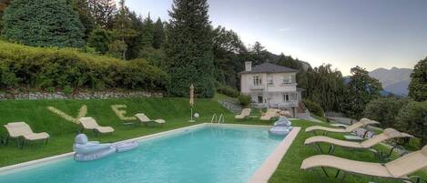 View to villa across private pool