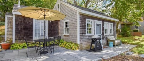 Front of cottage and patio