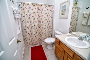 Attached Mickey Mouse themed bathroom - stand alone shower
