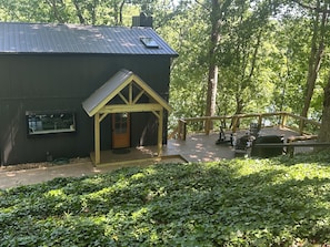 Front of the house with a new deck overlooking the lake!