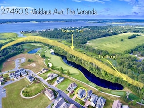 Aerial showing house (circled), 4th fairway, pond and nature trail