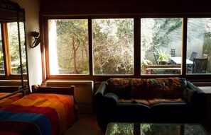 windows onto terrace and yard