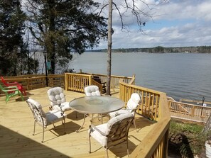 plenty of seating on split level deck to enjoy the water. Addt'l seating avail.