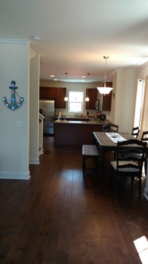 Open living room dining area and kitchen